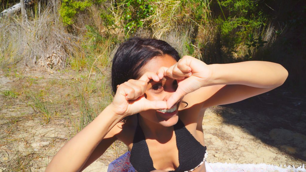 Zahra Soltanian (Wyld Yasmin) in bikini doing heart emoji